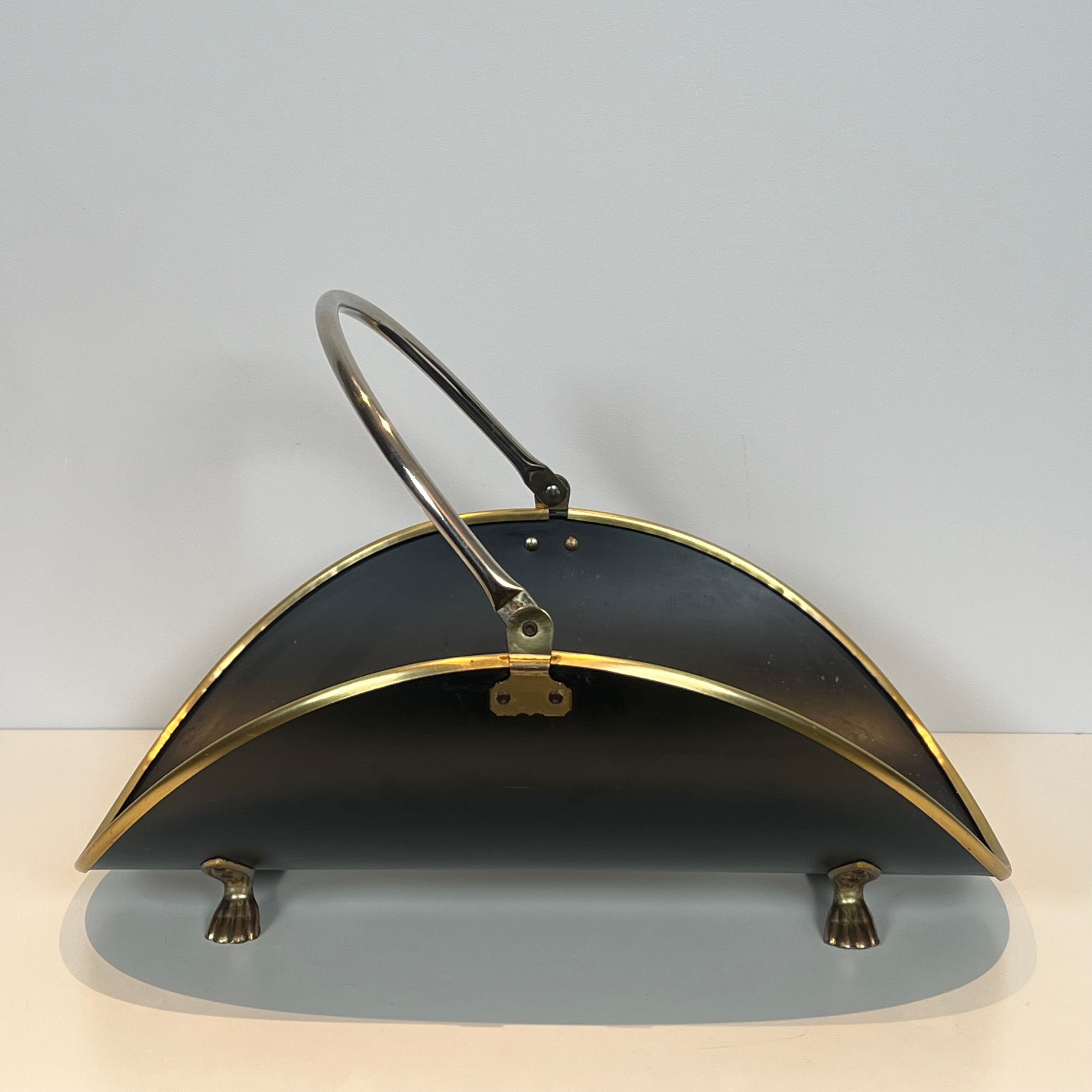 Neoclassical log holder in brass and black lacquered brass
