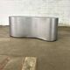 Table basse en acier inoxydable de forme organique