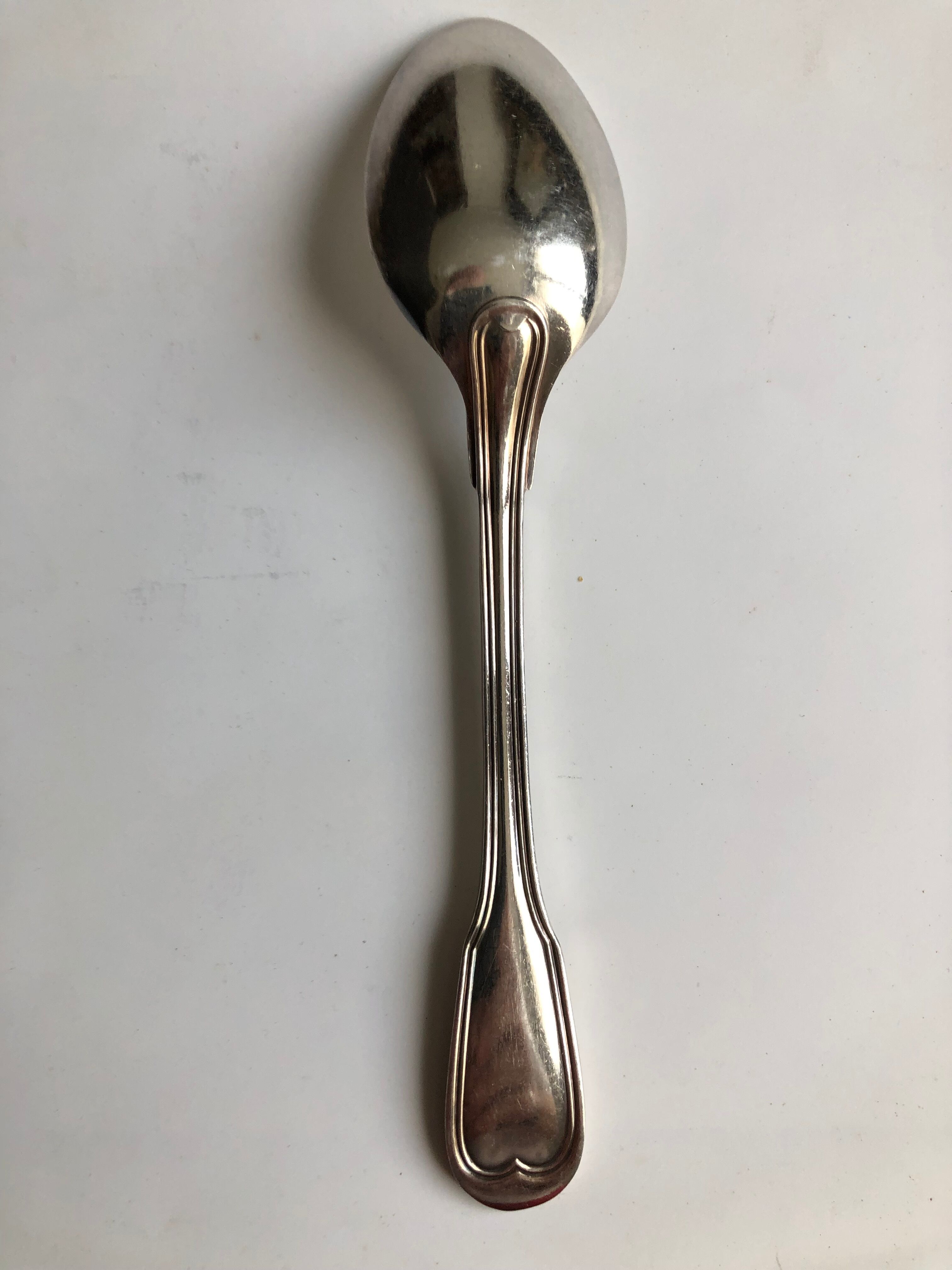 Set of 8 small silver metal spoons
