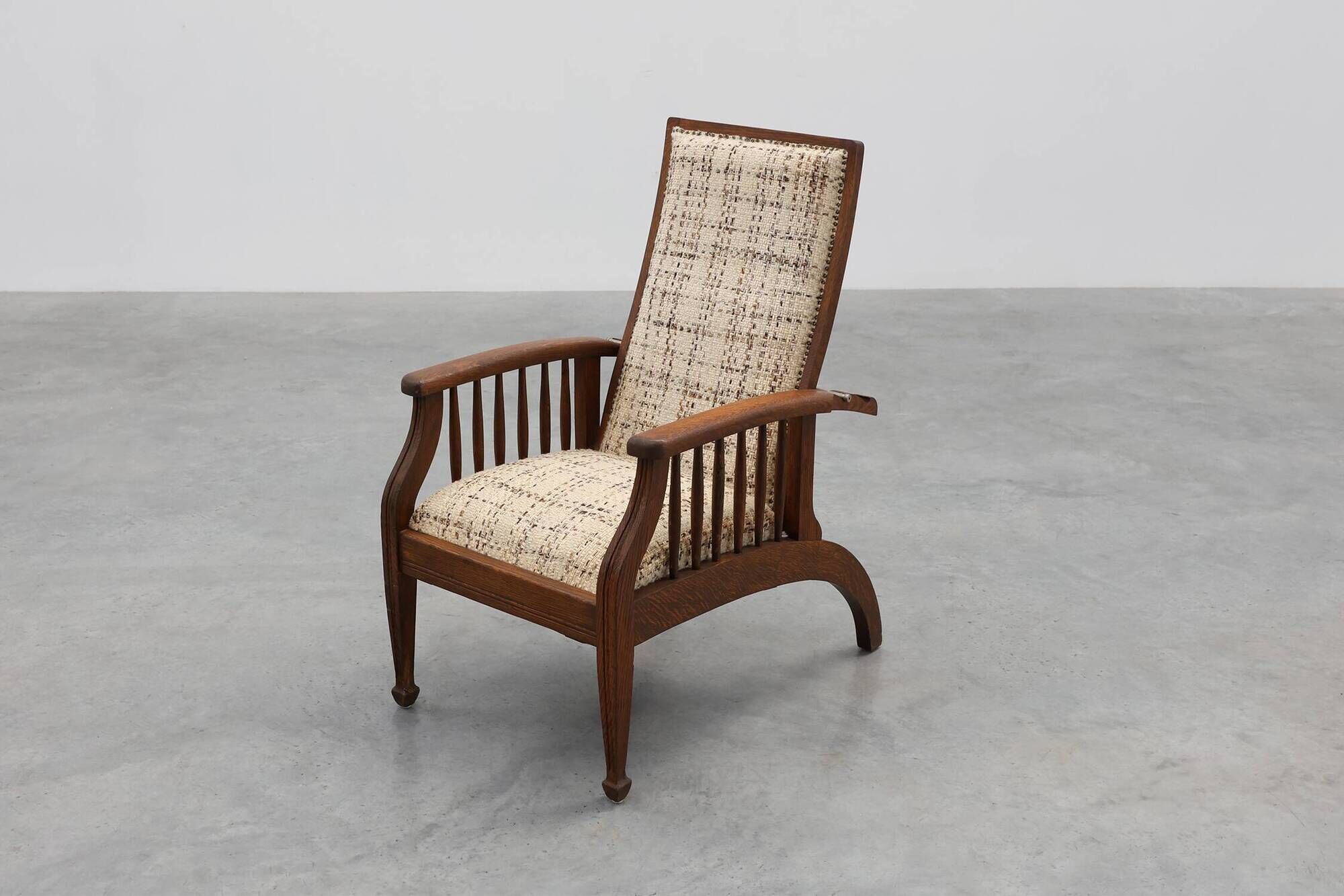 Arts & Craft oak armchair with spindle sides and tweed upholstery, Belgium