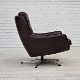 1970s, set of two swivel lounge chairs with footstool, leather.