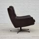1970s, set of two swivel lounge chairs with footstool, leather.