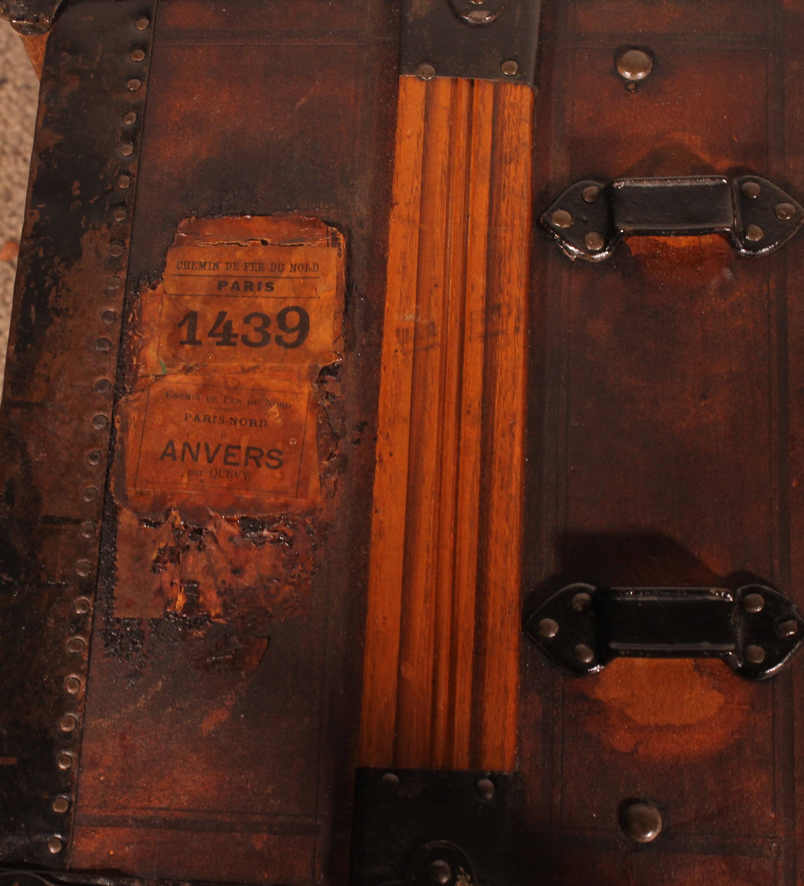 travel trunk from the early 20th century made of leather and wood