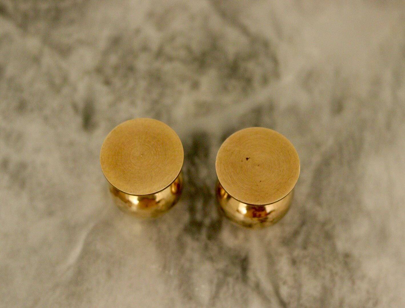 Pair of mid-century Swedish brass candle holders