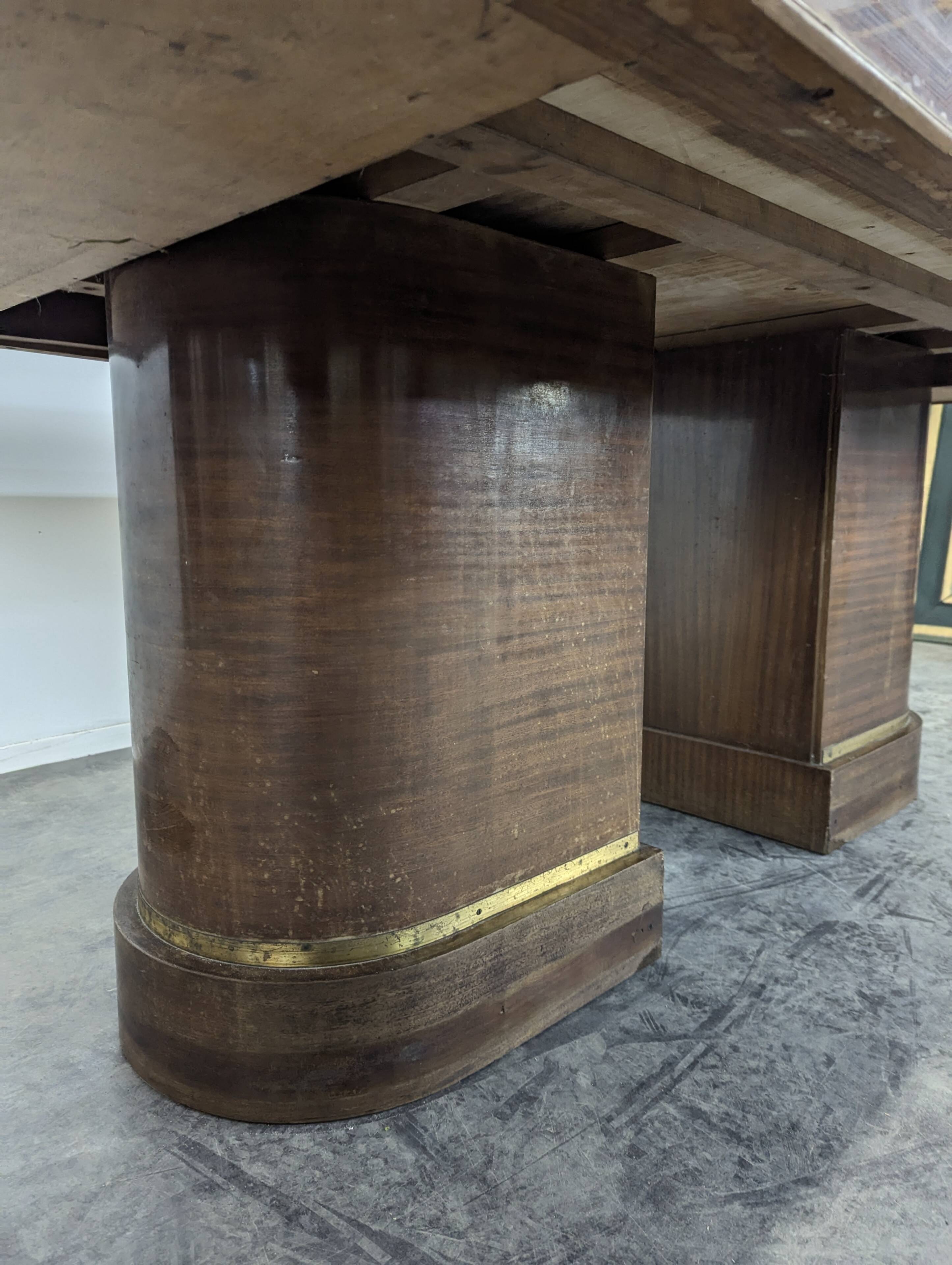 Modernist table in rosewood and brass