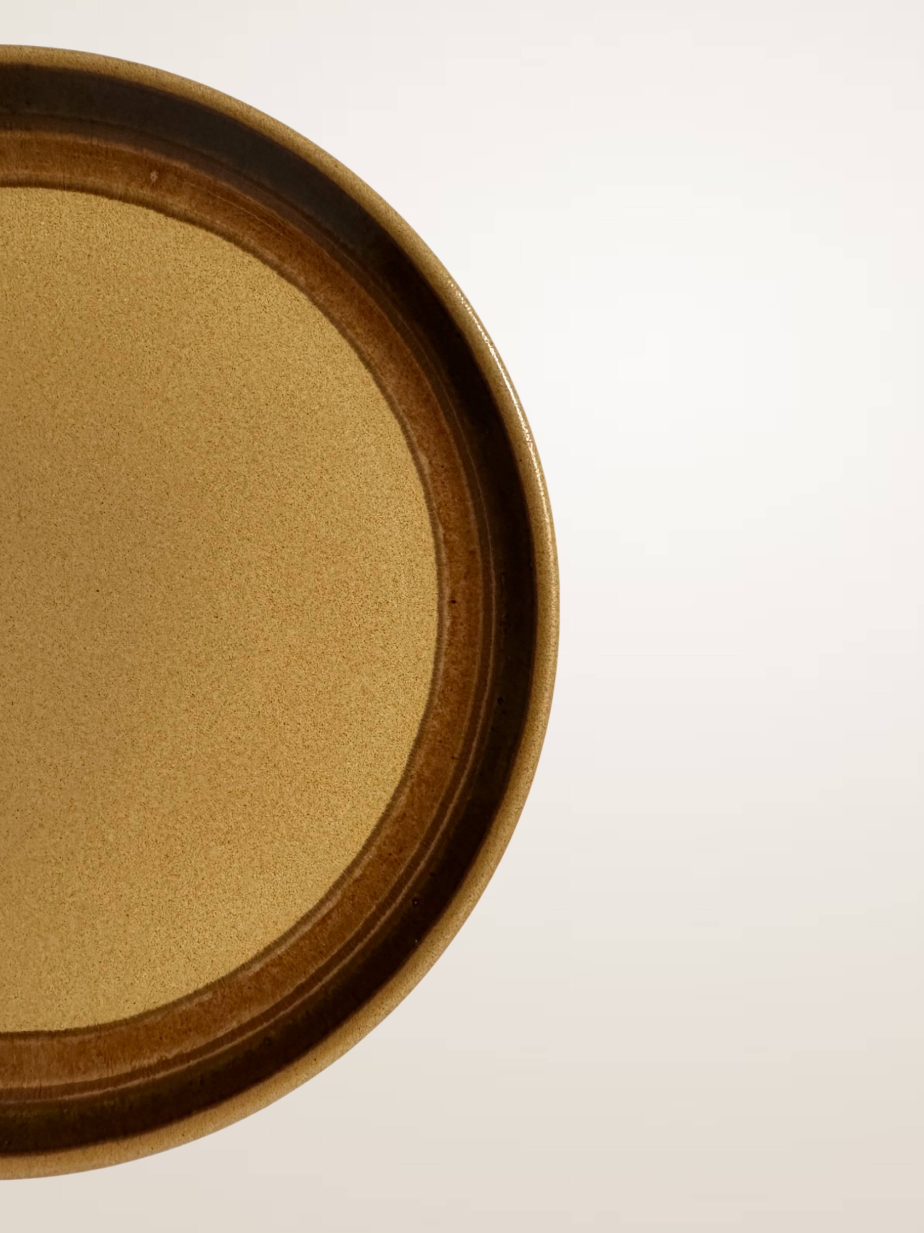Set of six glazed stoneware dessert plates.