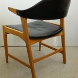 Danish armchair in oak and black leather