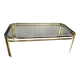 Table basse vintage années 70 en métal doré et verre fumé