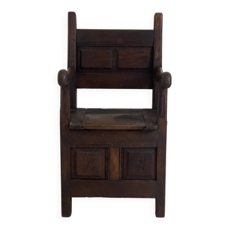 Fauteuil d’âtre formant coffre en chêne massif XVIIIème siècle