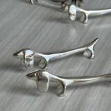6 dog-shaped knife rests, in silver-plated metal.