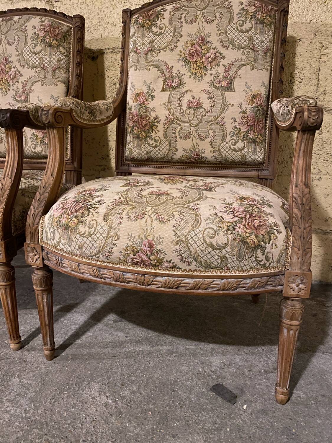 Pair of antique carved wooden armchairs