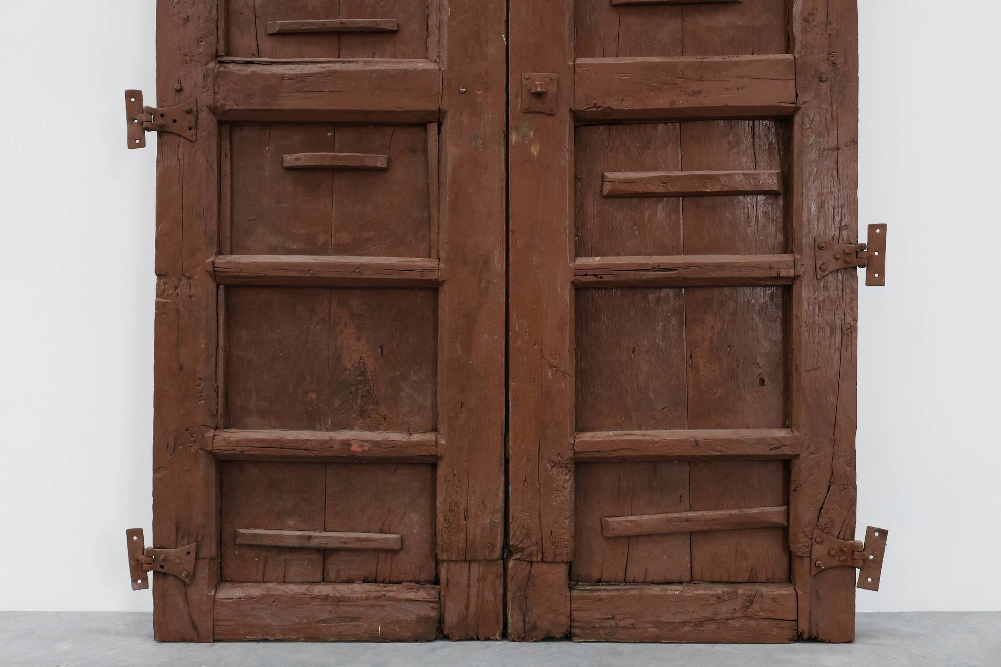Large 17th century Monastery doors in terracotta lacquered oak, Portugal