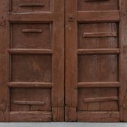 Large 17th century Monastery doors in terracotta lacquered oak, Portugal