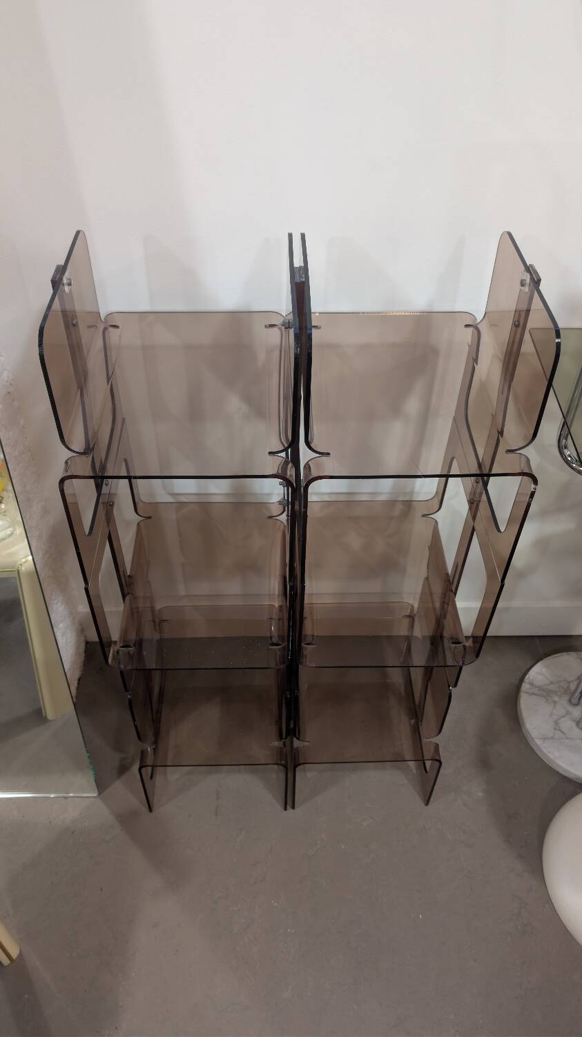 Smoked plexiglass bookshelf