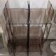 Smoked plexiglass bookshelf