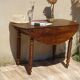 Antique walnut console table with honey spoon legs.