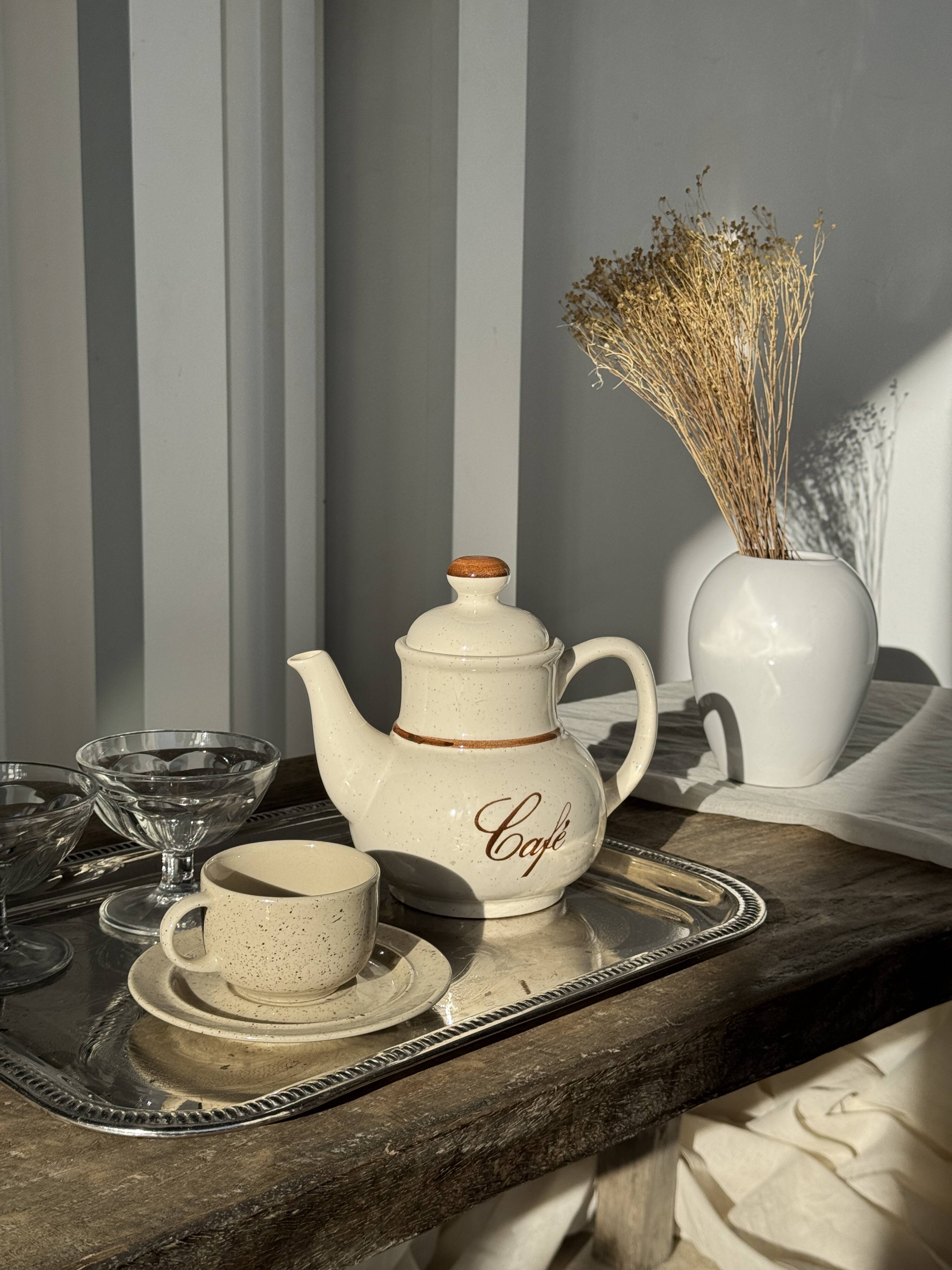 Set of 4 vintage speckled beige stoneware coffee cups.