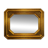 Antique octagonal mirror in gilded wood with painted floral decoration.