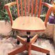 Adjustable office chair in light varnished wood from 1980. Chair sold individually.