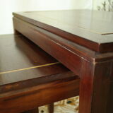 Pull-out tables in mahogany and vintage brass