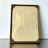 Metal frame in gold colored brass