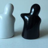 Ceramic salt and pepper shaker hugging ghosts, vintage from the 1980s