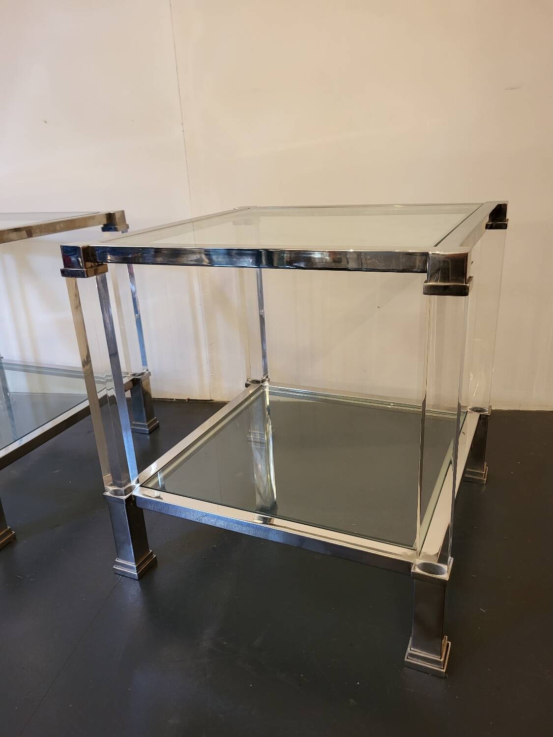 Paire de bouts de canapé en laiton chromé