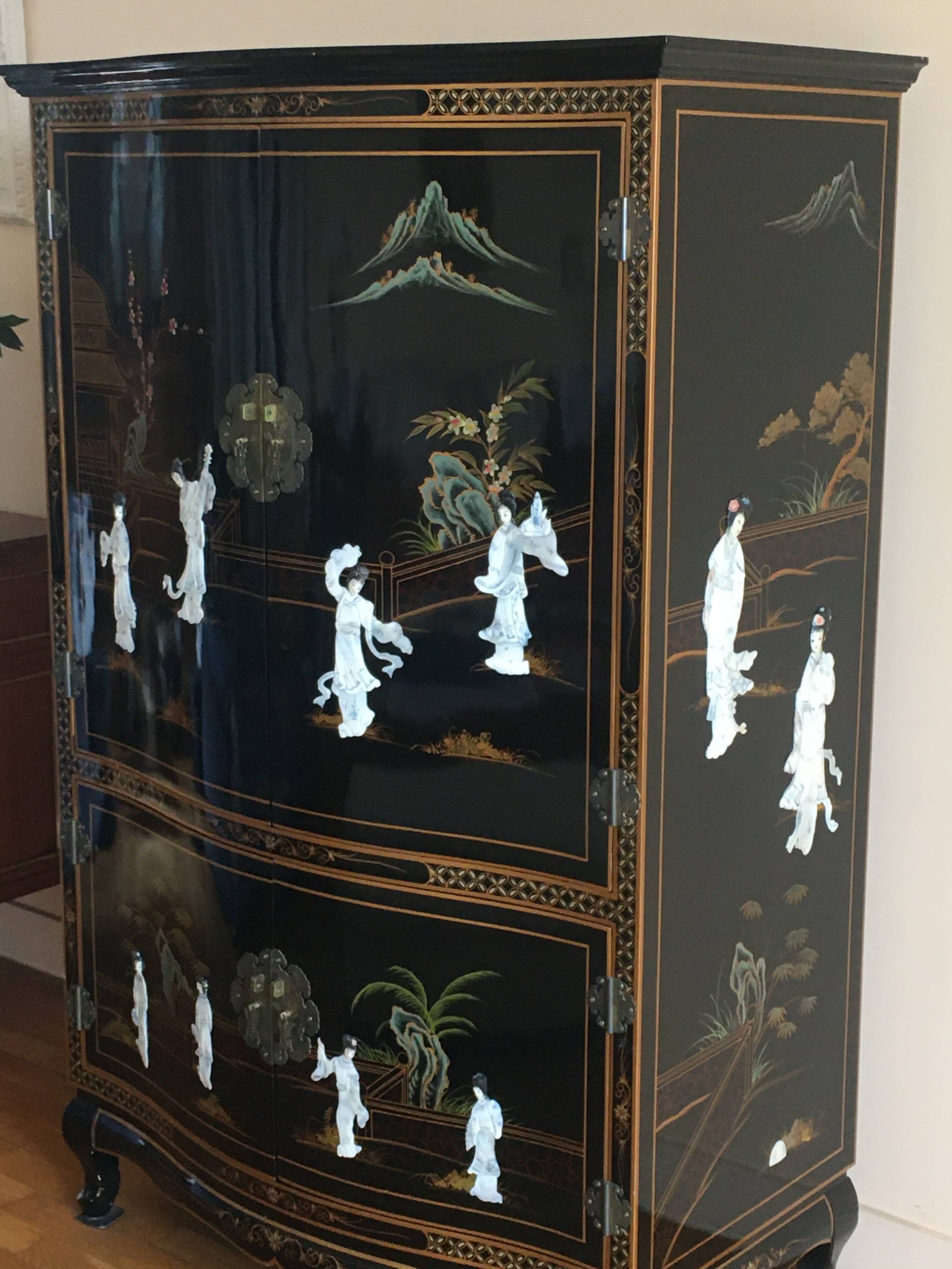 Black lacquered Chinese furniture with mother-of-pearl