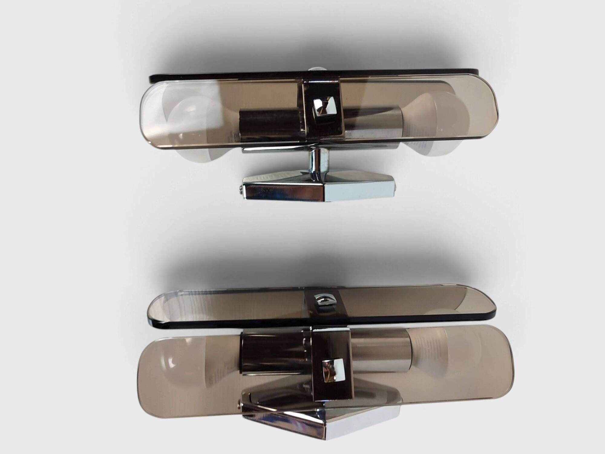 Pair of smoked glass and chrome wall lights attributed to Fontana Arte – Years