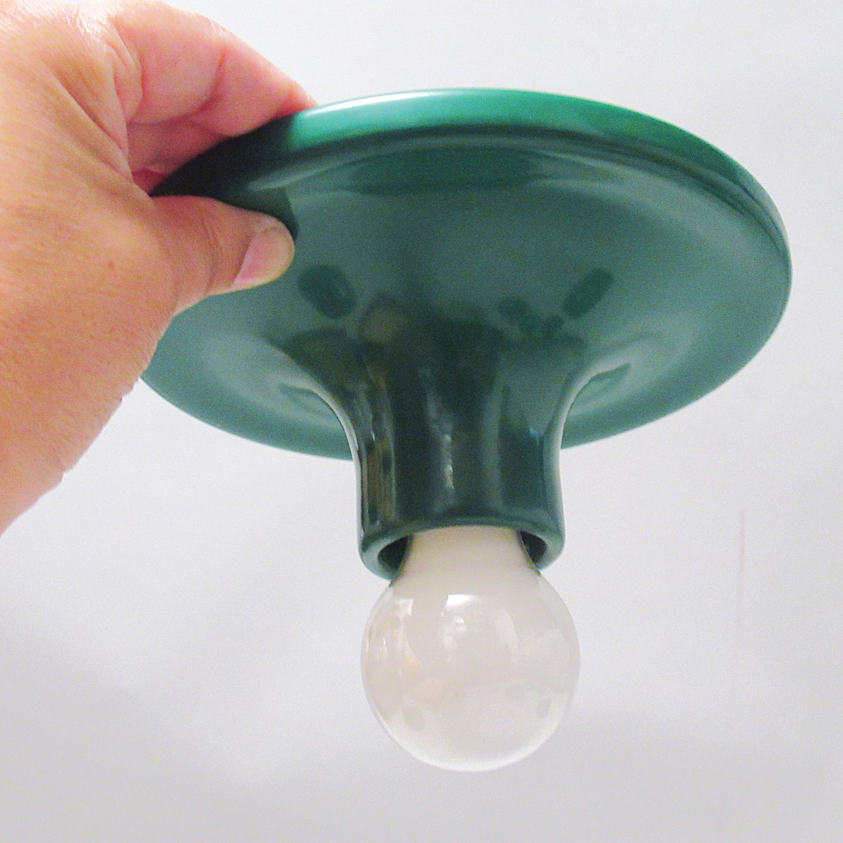 Green metal Teti wall light from the 1970s.