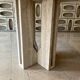 Round travertine dining table by Claude Berraldacci