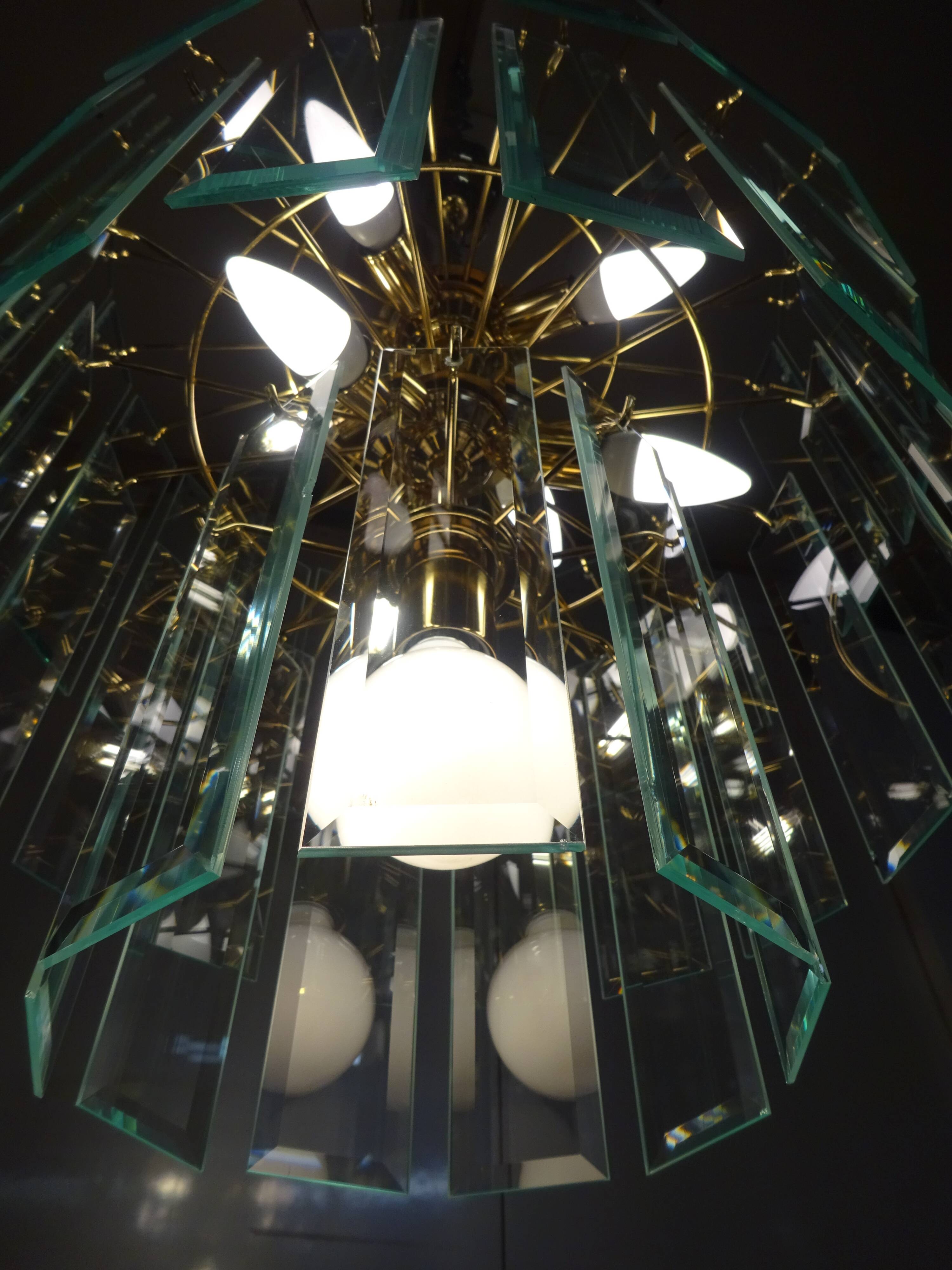 Brass chandelier and beveled glass, Italian manufacturing