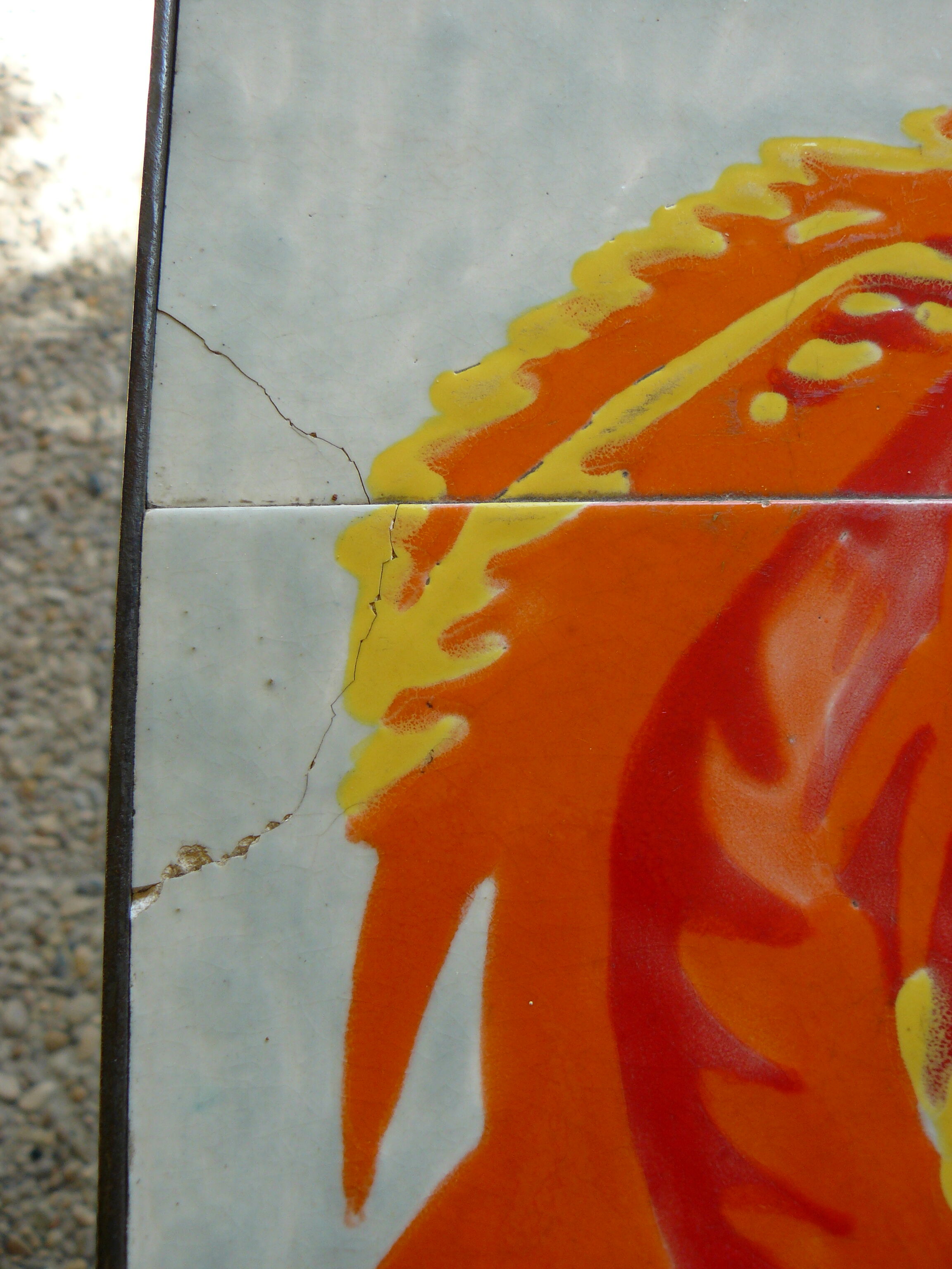 Metal and ceramic table