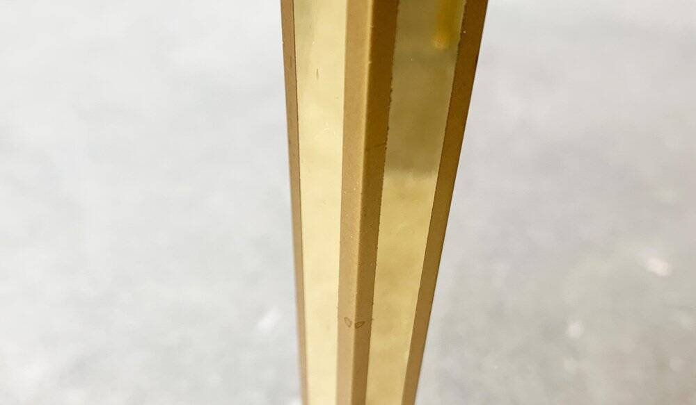 Mid-century Hollywood Regency style coffee table in brass and glass, made in Germany by Vereinigte Werkstätten, 1960s.