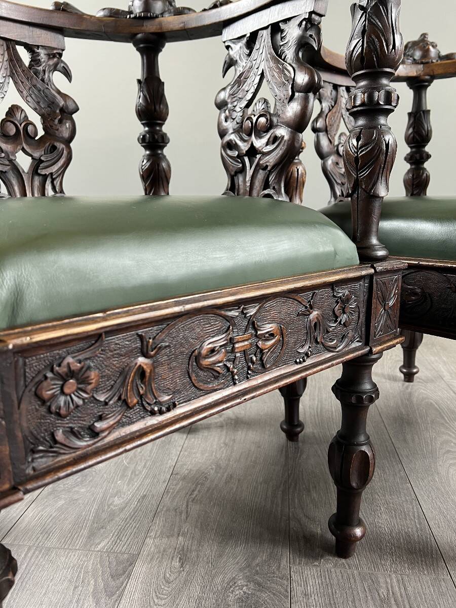 Pair of corner armchairs in carved wood, 19th century