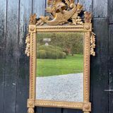 Miroir Louis XVl en bois sculpté doré, XVIIIème siècle