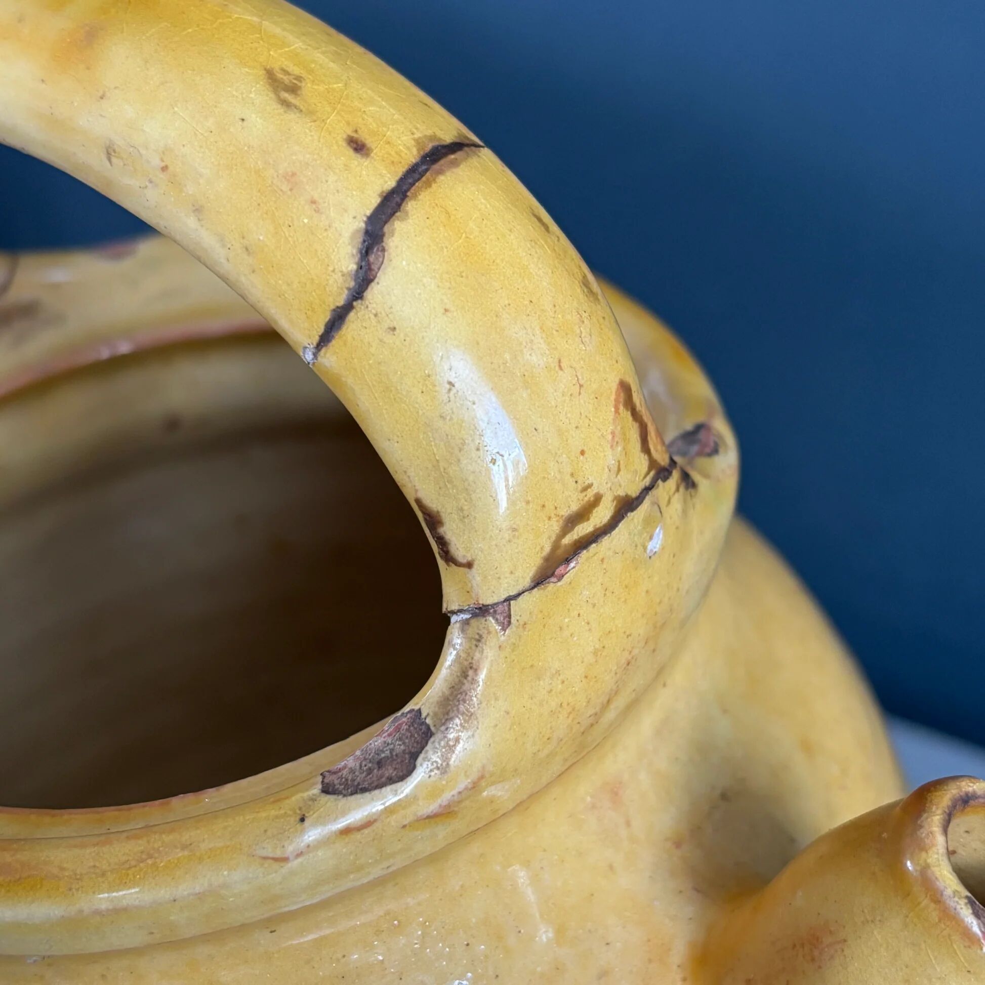 Ancient oil jar in glazed terracotta