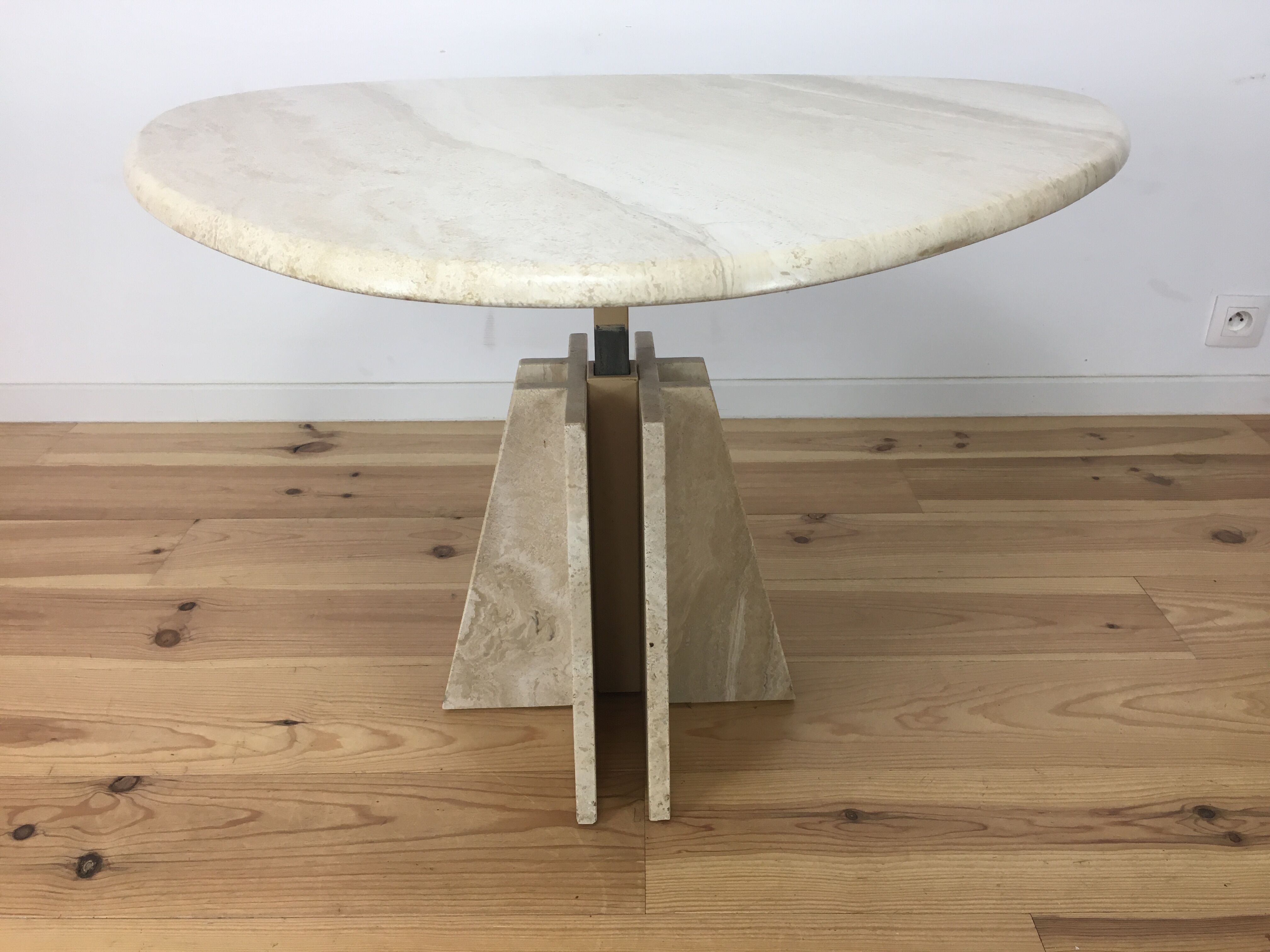 Travertine coffee table goes up and down to jack