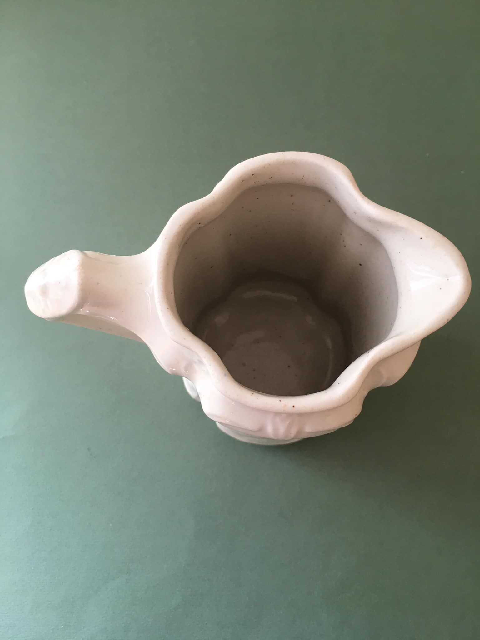 Antique ivory-coloured porcelain vase/pitcher