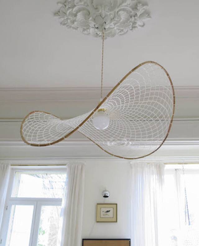 Curved rattan and rope pendant light