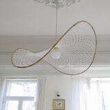 Curved rattan and rope pendant light
