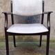 Armchair in wood and imitation leather