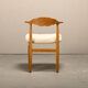 Henning Kjærnulf dining chairs set in Oak and Sheepskin, Denmark, 1960s