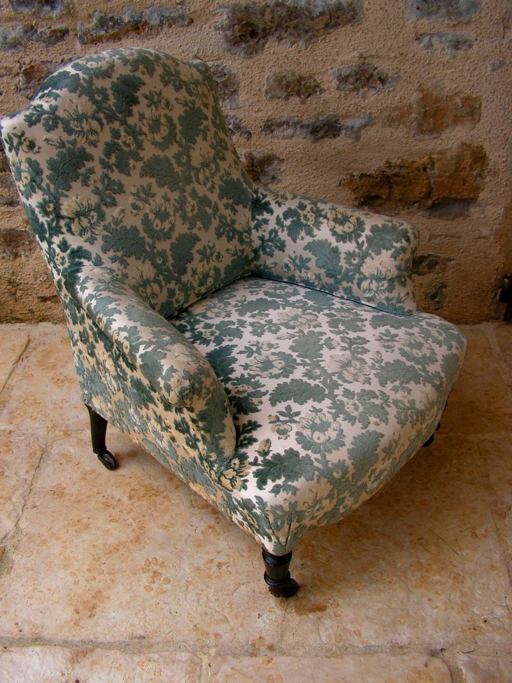 19th century armchair with foliage