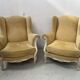 Pair of Louis XV style wing chairs in patinated beech, 20th century