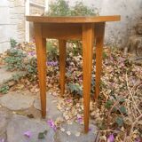 Honey-colored solid beech side table