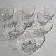 Set of Art Deco style engraved crystal bowls and glasses on spherical feet