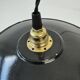 Pair of old industrial black enamelled pendant lights