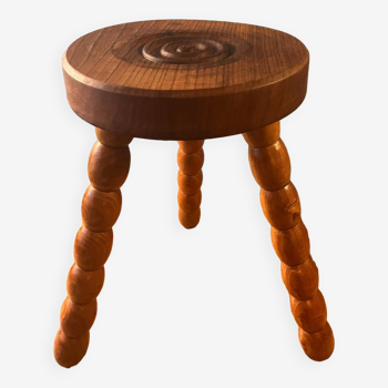 Imposing tripod stool in handmade carved wood