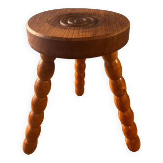 Imposing tripod stool in handmade carved wood